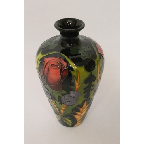 202 - A  Moorcroft vase decorated with Rose, Thistle & Shamrock pattern, emblems of the British Isles, des... 