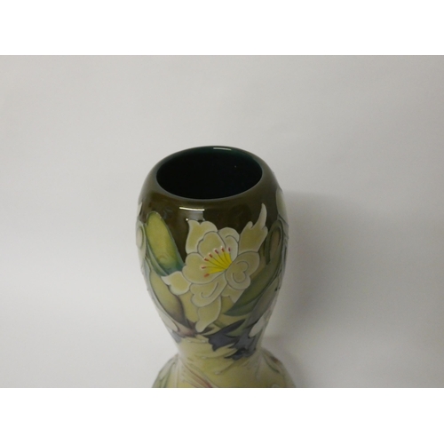 205 - A Moorcroft honey bee limited edition vase number 47/150, impressed marks and dated 2013, with box