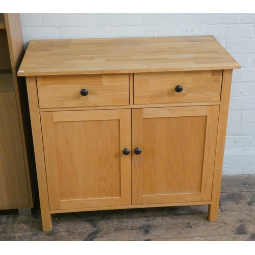 26 - A small light oak finished sideboard fitted two drawers and cupboards, 3' wide