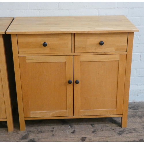 27 - A small light oak finished sideboard fitted two drawers and cupboards, 3' wide