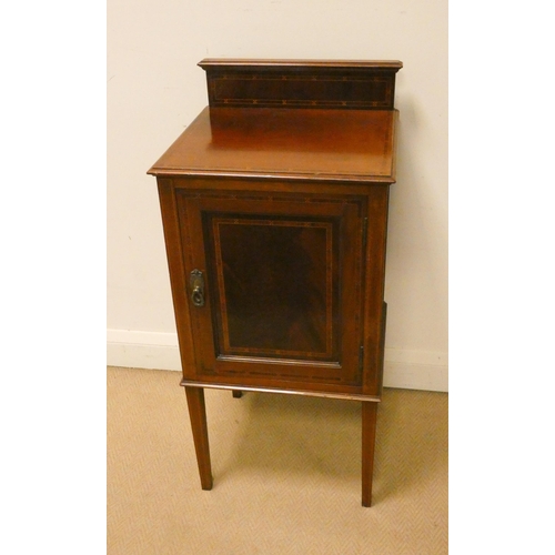 161 - An Edwardian inlaid mahogany bedside cabinet