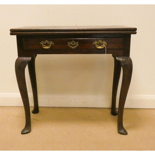 167 - A Victorian mahogany folding top tea table fitted one drawer on cabriole style legs, 2'6 wide