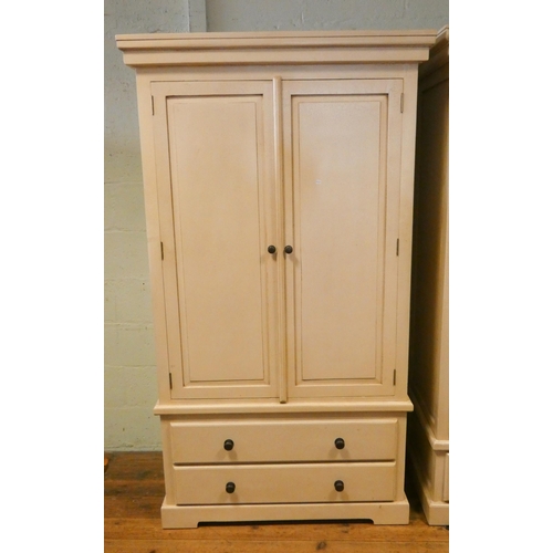 168 - A cream  two door wardrobe with two long drawers under, craquelure aged paint finish  40