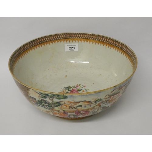 223 - A 19th century Chinese Famille Rose bowl decorated with village scenes, 12