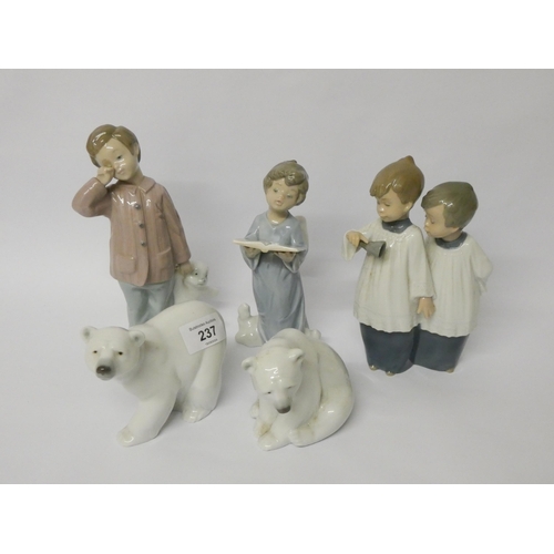 237 - Two Lladro polar bears, Lladro choir angel and two Nao figurines