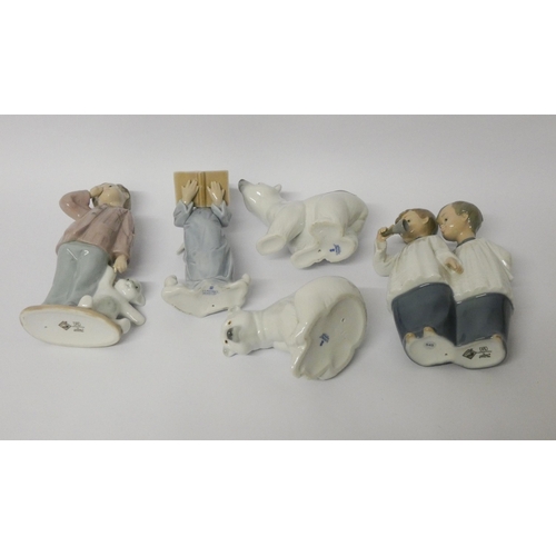 237 - Two Lladro polar bears, Lladro choir angel and two Nao figurines