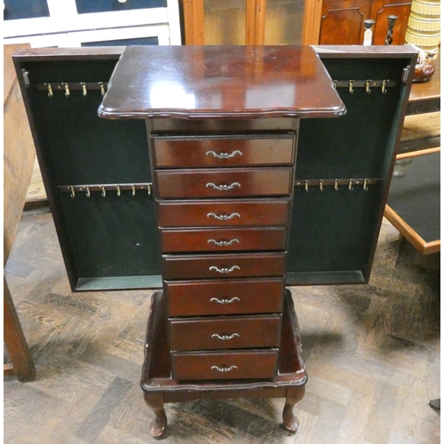 135 - A mahogany specimen chest or jewellery cabinet fitted eight drawers with brass handles and side open... 