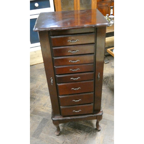 135 - A mahogany specimen chest or jewellery cabinet fitted eight drawers with brass handles and side open... 