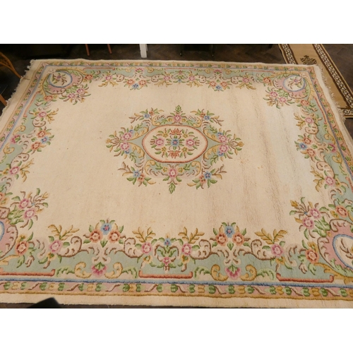 145 - A cream and floral patterned Indian carpet, 12' X 9'