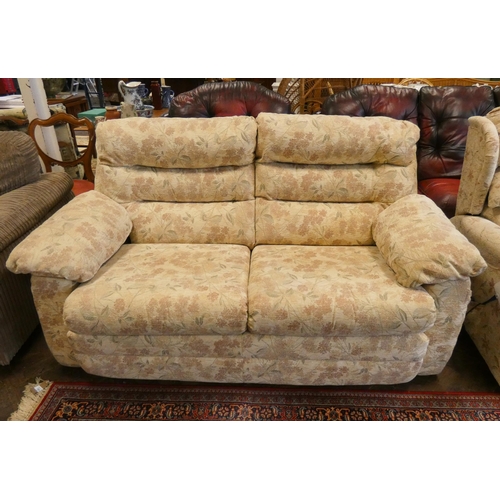 157 - A cream and floral decorated two seater settee with loose cushions