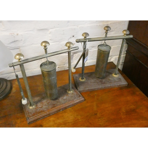 178 - A pair of Victorian brass shell gongs on stands with beaters