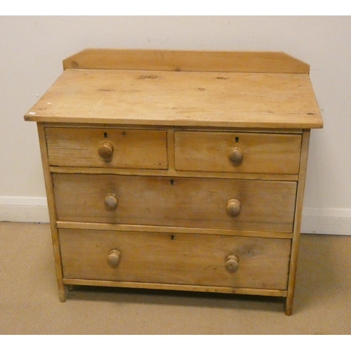 186 - A late Victorian stripped and waxed pine chest of two long and two short drawers with bun handles, 3... 