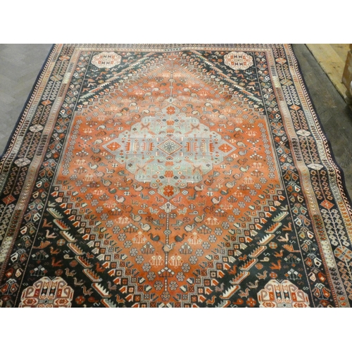 191 - A red and patterned Persian design Wilton rug, 9'3 X 6'6