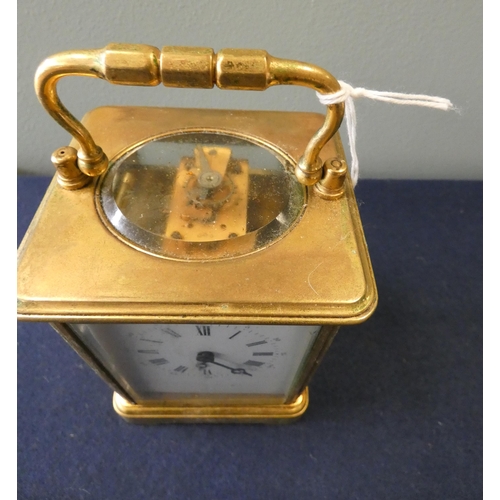 219 - A large striking gilt brass carriage clock