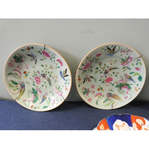 220 - A pair of Japanese Imari wall plates and a pair of Chinese Famille Vert wall plates