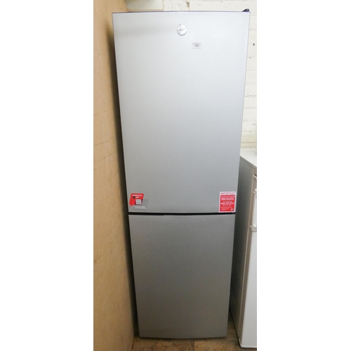 444 - A Hoover half and half fridge freezer in silver case