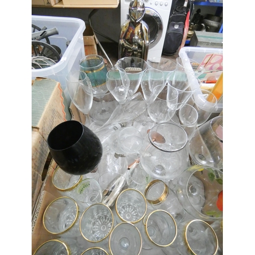 369 - A large box containing drinking glasses and a knight companion set