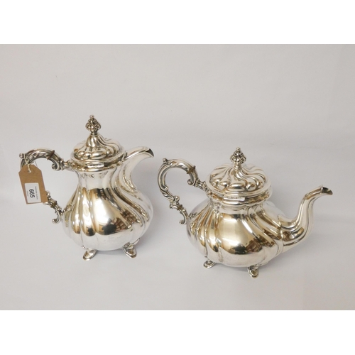 665 - German 835 silver lobed tea and coffee pot, standing on scrolled feet, marked crescent crown, 835 on... 