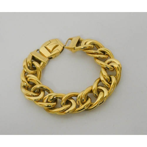 536 - 18ct yellow gold wide curb link chain bracelet, hallmarked o clasp, 20.5 cms long, 18mm wide. Gross ... 