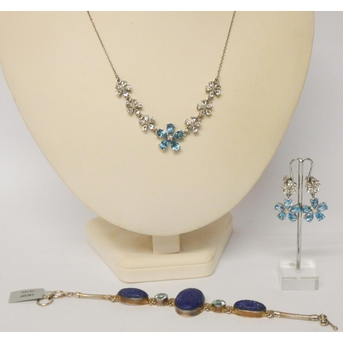 552 - Swiss blue topaz flower cluster necklace and matching earrings in 925 silver and a chunky carved lap... 