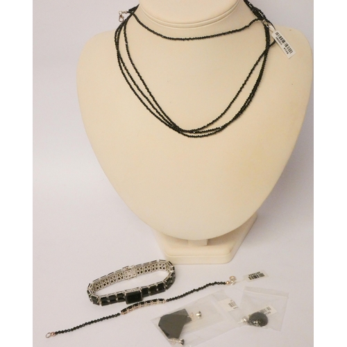 555 - Silver and black spinel bracelets, multi strand necklace, pendant and a pair of ear studs.