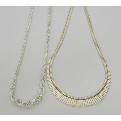 564 - Silver Cleopatra collar necklace and a graduated silver rope chain necklace.