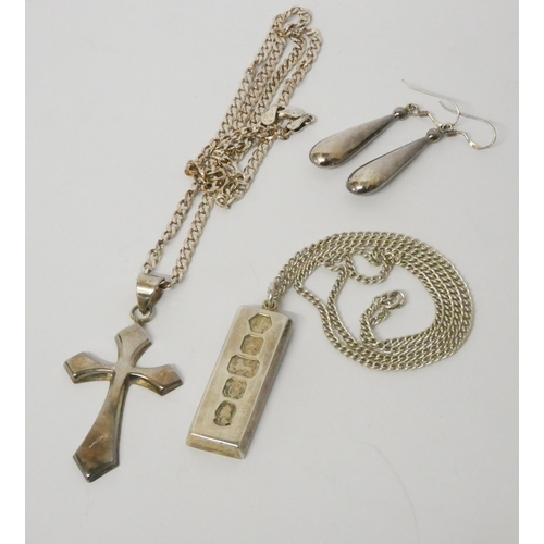 567 - Silver ingot pendant on chain, silver cross pendant on chain and a pair of silver drop earrings.