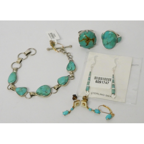 589 - A silver and turquoise panel bracelet, two silver and turquoise dress rings and various pairs of tur... 