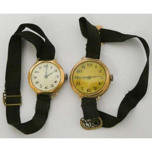 602 - Two 1930's 9ct gold case ladies wristwatches, both with fabric straps. Gross weight 26 grams