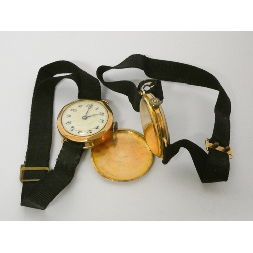 602 - Two 1930's 9ct gold case ladies wristwatches, both with fabric straps. Gross weight 26 grams