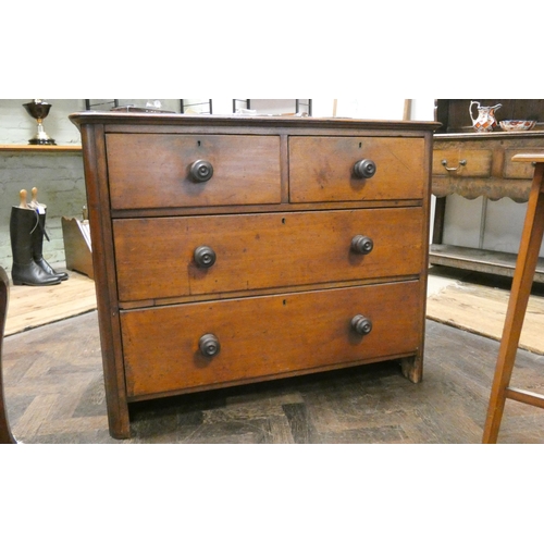 175 - A Victorian mahogany chest of two long and two short drawers with bun handles, 40