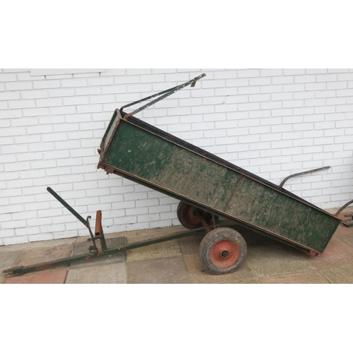 461 - A metal tipping garden trailer for use behind small tractor or ride on mower, 3' wide and 6' long be... 