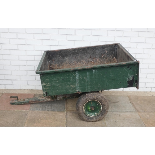 462 - A small two wheel metal garden trailer, bed measures 33