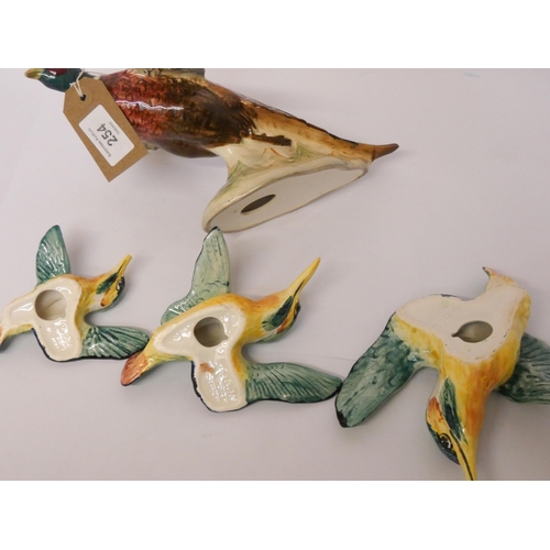 254 - Beswick Pheasant and set of three wall mounting Kingfishers