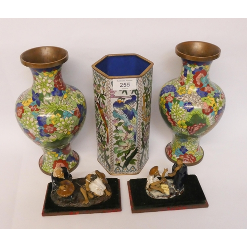 255 - A pair of cloisonné vases, a hexagonal bodied cloisonné vase and two Japanese pottery figures