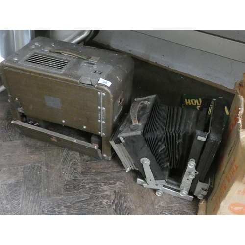 408 - An old projector with accessories etc