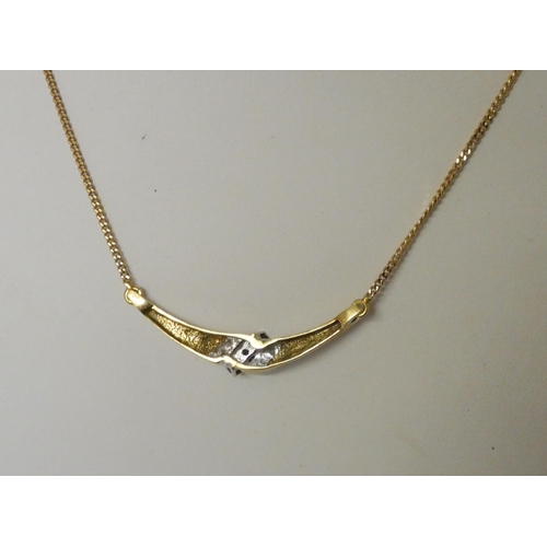 500 - A modern 18ct yellow gold sapphire and diamond necklace. Gross weight 7.2g