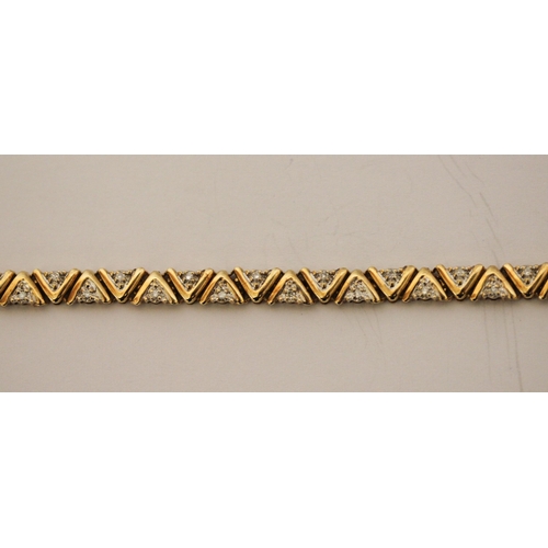 508 - Modern 9ct yellow gold and diamond bracelet, clasp hallmarked. Gross weight 9.2g, length 19.5cms