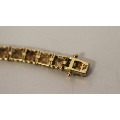 508 - Modern 9ct yellow gold and diamond bracelet, clasp hallmarked. Gross weight 9.2g, length 19.5cms