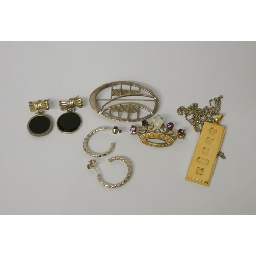 510 - A silver gilt ingot, silver hoop earrings, silver oval brooch, silver neck chain etc