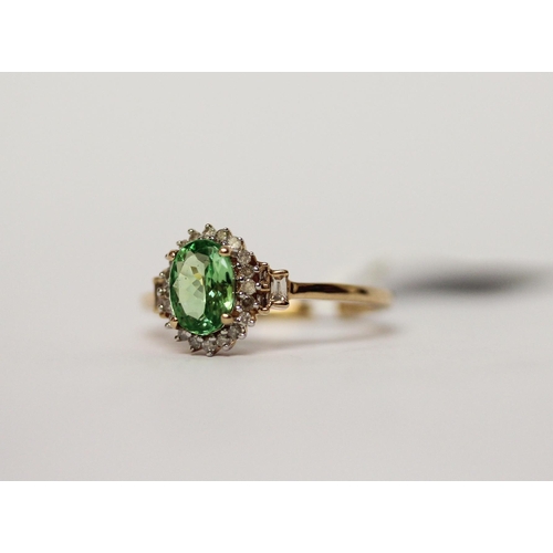 590 - 9ct peridot and diamond oval cluster dress ring, size M.