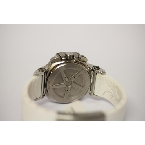 609 - Tissot -  T-Race stainless steel and white dial wristwatch on white rubber strap