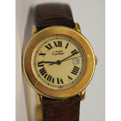 615 - Cartier Ronde Must De Cartier quartz wristwatch, 36mm silver gilt dial, with brown leather strap and... 