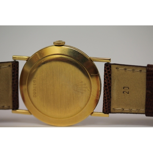 617 - Gold Rolex Precision vintage 18ct gold wristwatch
with champagne dial and gold hands on a brown leat... 