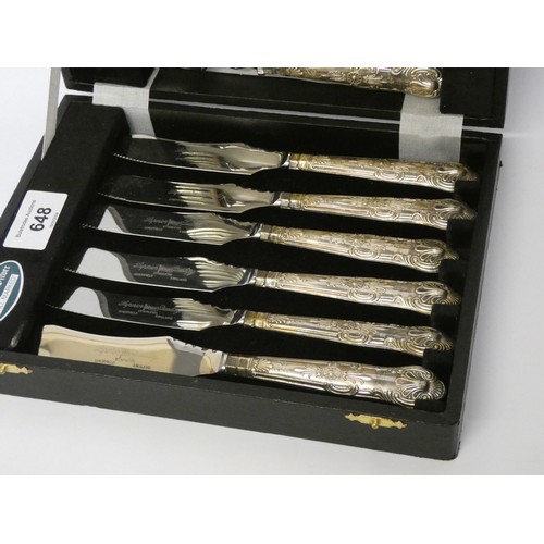 648 - A cased set of six fish knives and forks with hallmarked silver handles