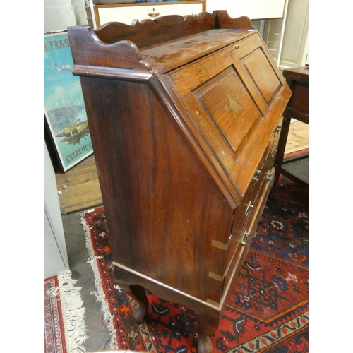 192 - A Chinese brass inlaid hardwood bureau with six drawers under standing on cabriole legged stand, 37