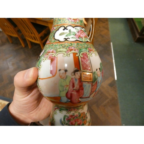 221 - A Chinese Famille Rose twin handled narrow necked vase and a Japanese Satsuma vase, Famille Rose vas... 