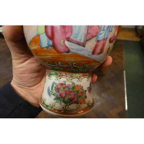 221 - A Chinese Famille Rose twin handled narrow necked vase and a Japanese Satsuma vase, Famille Rose vas... 