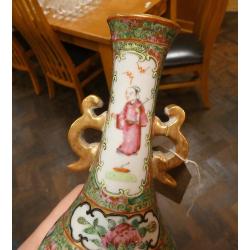 221 - A Chinese Famille Rose twin handled narrow necked vase and a Japanese Satsuma vase, Famille Rose vas... 