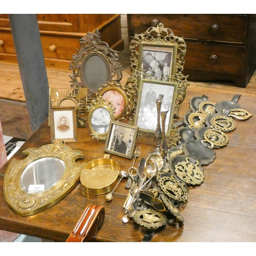 Two martingales with brasses, brass shield shaped mirror, various brass ...